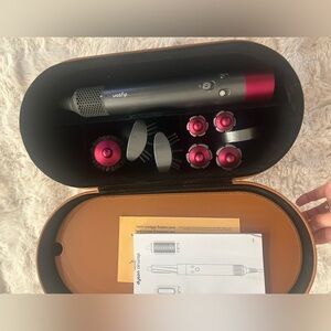 Dyson multi-styling set in fuchsia and gunmetal